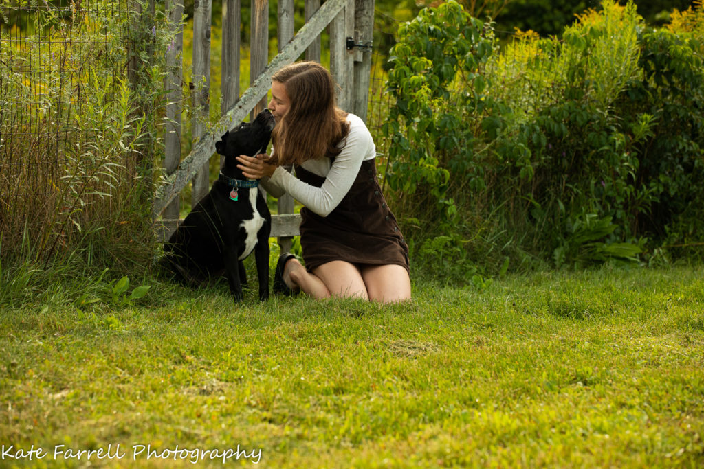 Teenaged girl and her beloved dog. Image credit: Kate Farrell a professional photographer in Vermont.