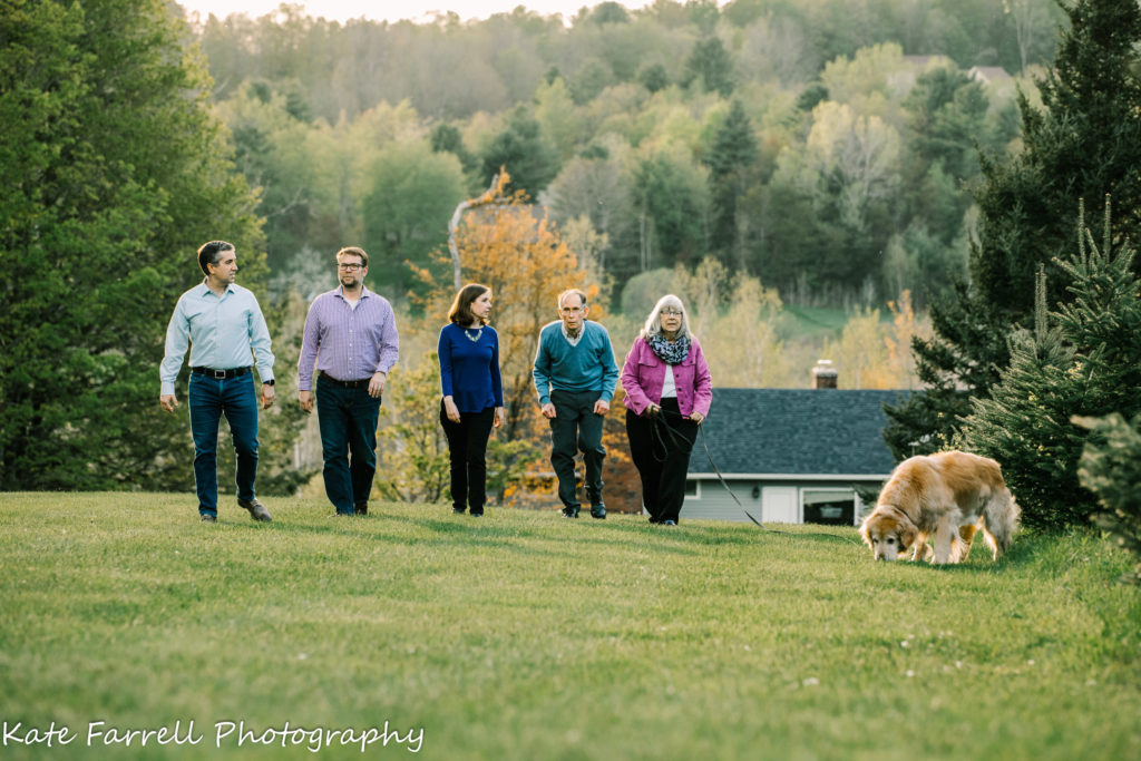 Family of five walking their dog. Vermont family reunion photograph