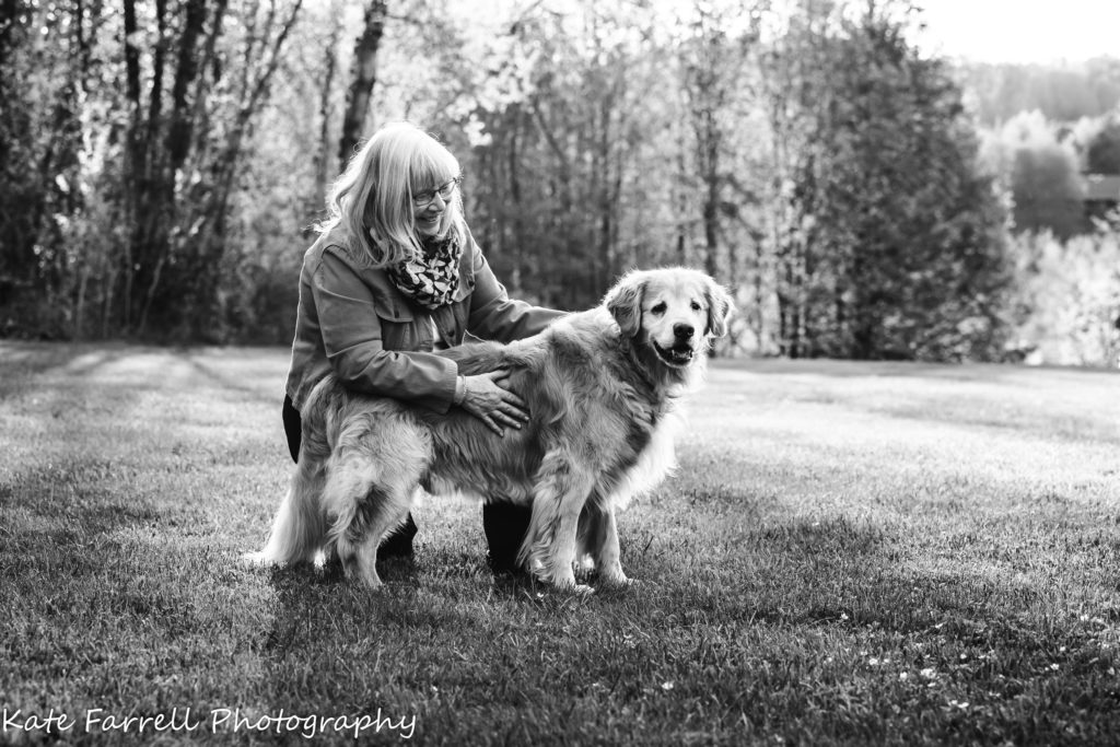 Black and white image of a woman and her beloved dog.