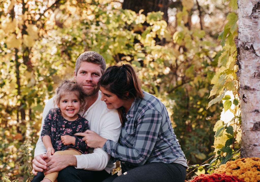 Parents and toddler at a Vermont family photo session. 