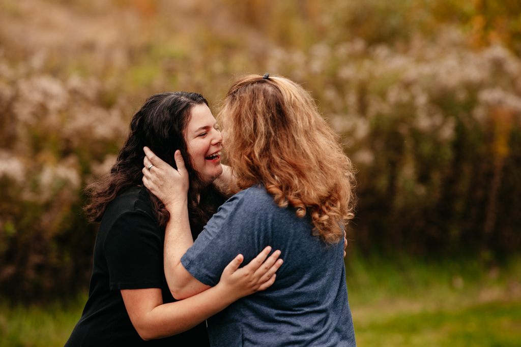 Mom congratulating her daughter on her senior year  at a lifestyle family photography session!