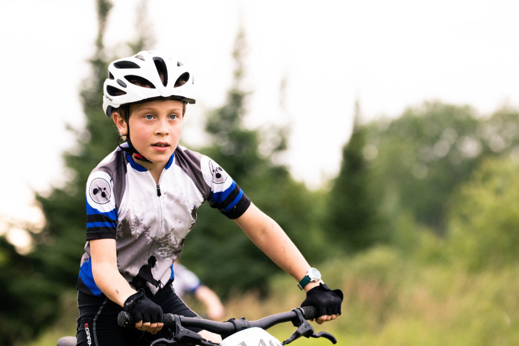 10 year old boy mountain biking.