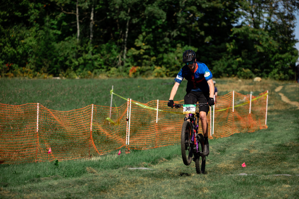  Vermont Youth Cycling Race at the Kingdom Trails. A finish line wheely.