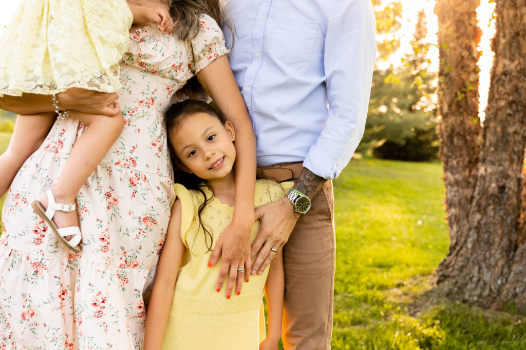 Close up of a family in the spring by lifestyle family photographer, Kate Farrell.